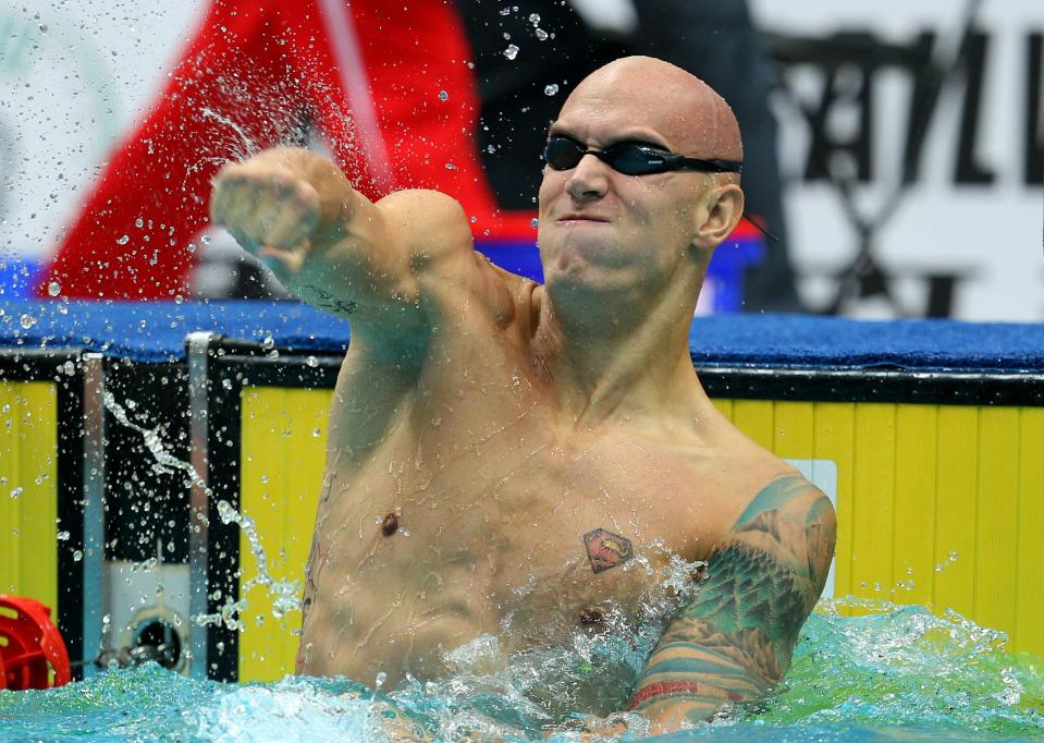 DELHI, INDIA - OCTOBER 07: Brent Hayden of Canada celebrates finishing the Men's 100m Freestyle Final in first place and wins the gold medal at the Dr. S.P. Mukherjee Aquatics Complex during day four of the Delhi 2010 Commonwealth Games on October 7, 2010 in Delhi, India. (Photo by Cameron Spencer/Getty Images)