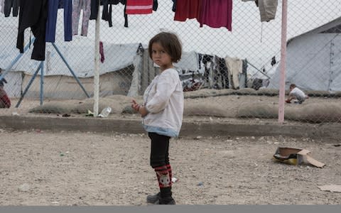 A girl stands in the section for foreign families at a camp for people who lived under ISIS and are now displaced, in Al Hol, near Hasakeh in Syria - Credit: Sam Tarling&nbsp;/The Telegraph