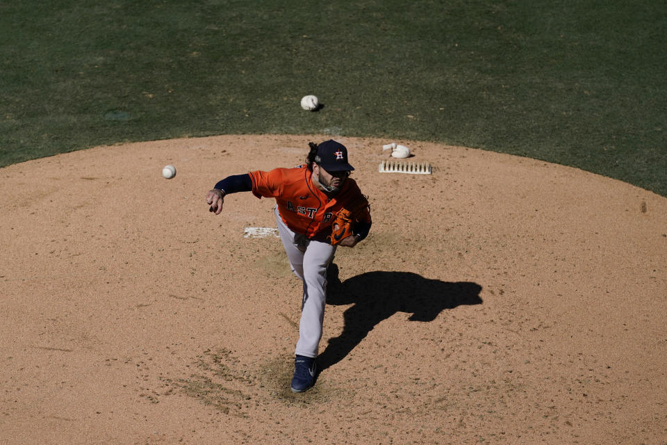 Houston Astros starting pitcher Lance McCullers Jr. pitches during the third inning in Game 2 of a baseball American League Championship Series against the Tampa Bay Rays, Monday, Oct. 12, 2020, in San Diego. (AP Photo/Ashley Landis)