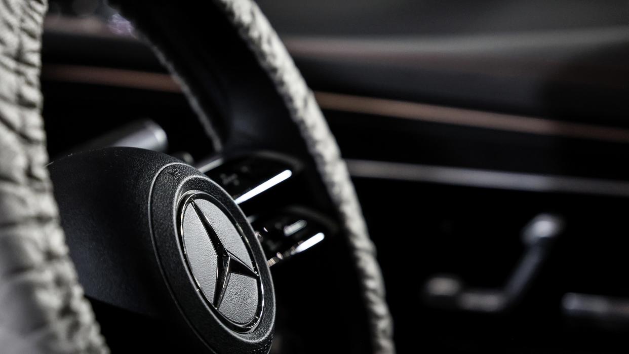  The steering wheel of a Mercedes-Benz vehicle. 