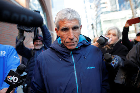 William "Rick" Singer leaves the federal courthouse after facing charges in a nationwide college admissions cheating scheme in Boston, Massachusetts, U.S., March 12, 2019. REUTERS/Brian Snyder