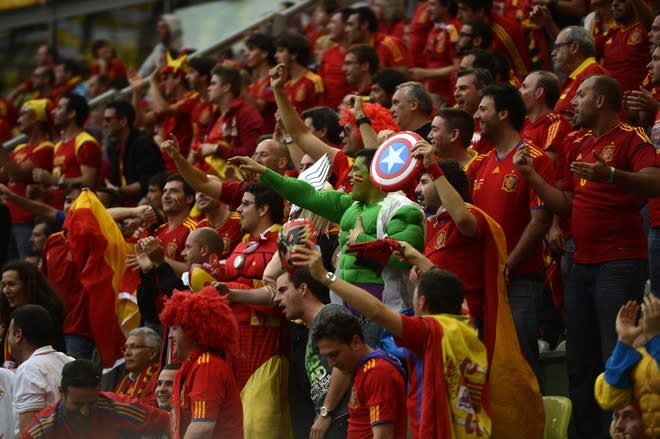 Spanish fans cheer during the Euro 2012 championships football match Spain vs Italy on June 10, 2012 at the Gdansk Arena. AFP PHOTO / PIERRE-PHILIPPE MARCOUPIERRE-PHILIPPE MARCOU/AFP/GettyImages