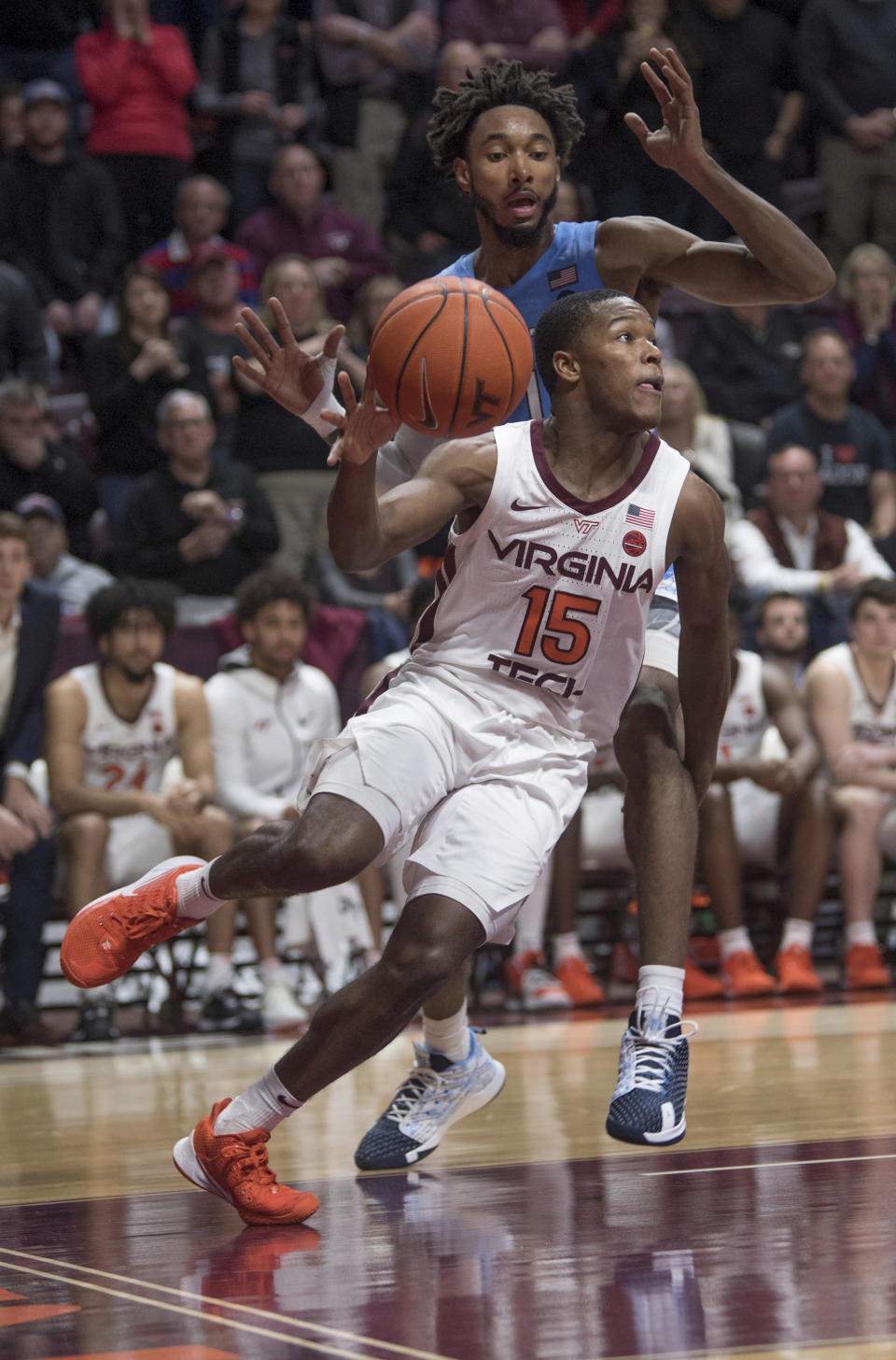 Virginia Tech guard Jalen Cone maintains his dribble in front of North Carolina defender Rechon Black (1) during the second half of an NCAA college basketball game in Blacksburg, Va., Wednesday, Jan. 22, 2020.(AP Photo/Lee Luther Jr.)