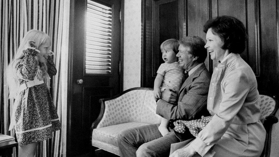 Jimmy Carter with grandson, Jason, wife, Rosalynn, and daughter, Amy, at the Americana Hotel. - Dan Farrell/NY Daily News Archive/Getty Images