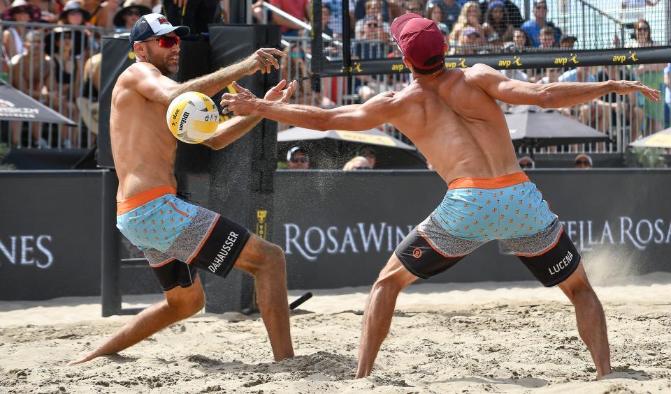 Phil Dalhausser, left, and Nick Lucena cannot return a spike during a match against their opponents, Chaim Schalk and Jeremy Casebeer,  during an AVP game in August 2019 in Manhattan Beach, Calif. They are among the athletes featured in the BYB Pictures documentary series, "AVP Uncovered: Best of the Beach," which is to debut Thursday night on YouTube.