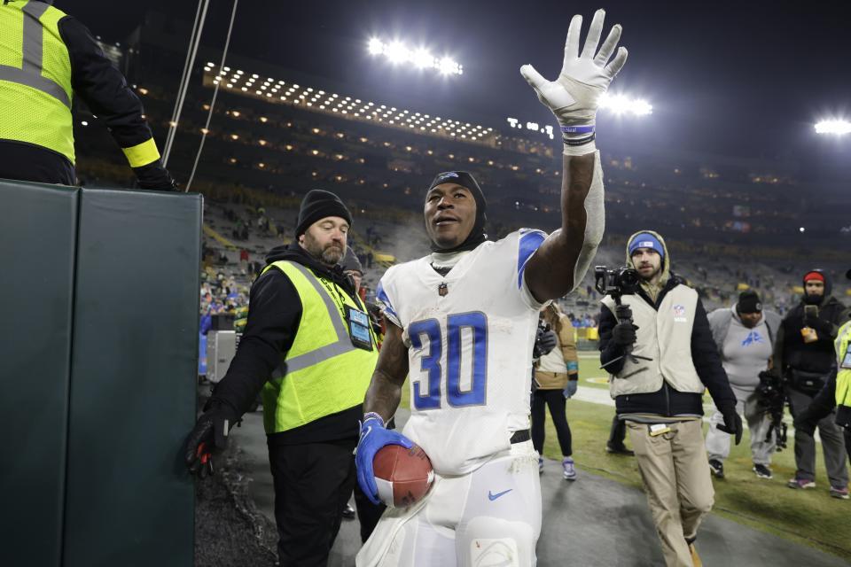 Detroit Lions running back Jamaal Williams celebrates following a game against the Green Bay Packers Sunday, Jan. 8, 2023, in Green Bay, Wis. The Lions won 20-16. | Matt Ludtke, Associated Press