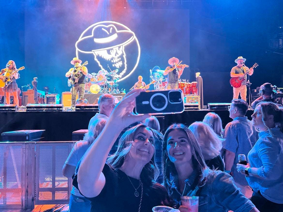 Concertgoers pose for a photo during the Zach Brown Band concert during last summer's Concert for Legends at Tom Benson Hall of Fame Stadium.