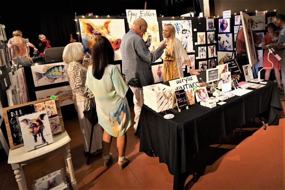 Attendees at Art on the Border show and sale at the Blue Lion in downtown Fort Smith in 2019.