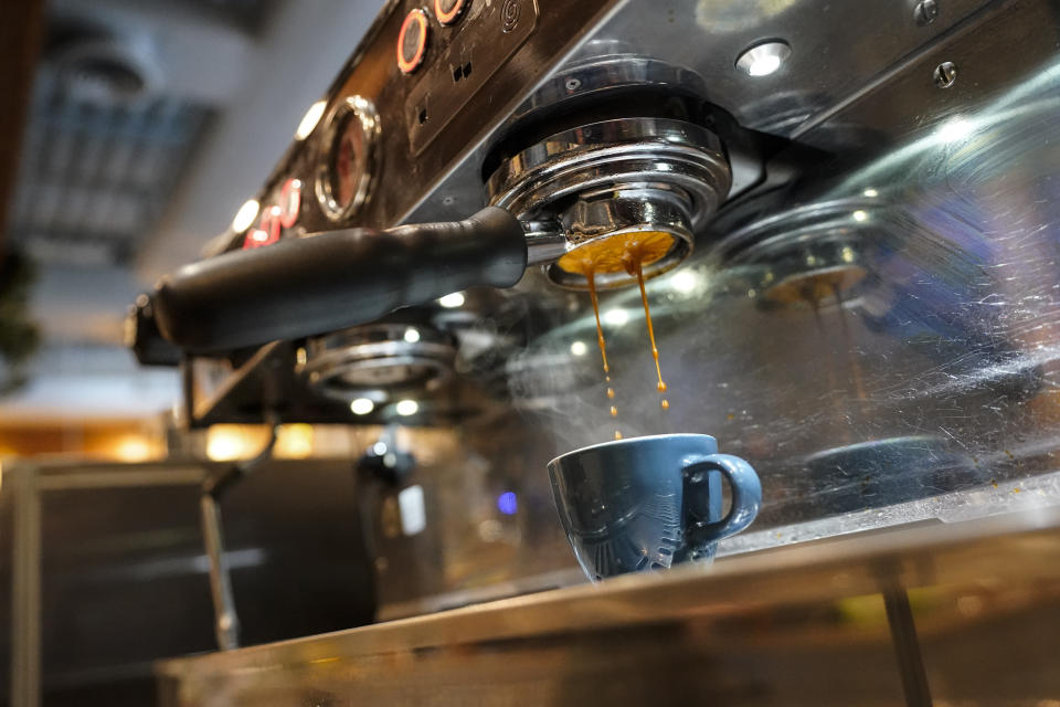 Coffee is prepared at Vigilante Coffee, Wednesday, Sept. 1, 2021, in College Park, Md. A confluence of supply chain problems, drought, frost and inflation all point to the price of your cup of morning coffee going up. The tricky part is trying to figure when — and how much. A sustained drought followed by two July frosts blew a hole in Brazil's coffee output, sending futures contract prices for the popular Arabica bean to near seven-year highs. (AP Photo/Julio Cortez)