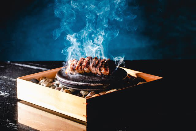 <p>Libby Vision</p> Steak cooked over hot stones at Gekko in Miami