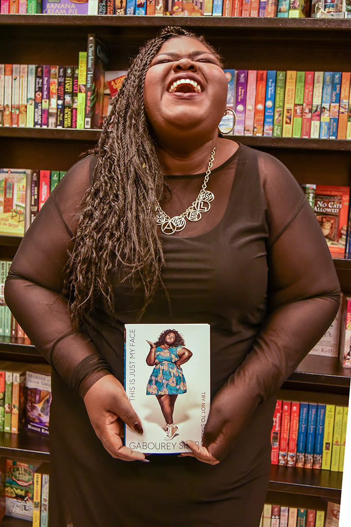 <p>The <em>Empire</em> was clearly elated while attending an L.A. book signing and discussion for her new tome, <em>This Is Just My Face: Try Not To Stare</em>. (Photo: Brandon Williams/Getty Images) </p>