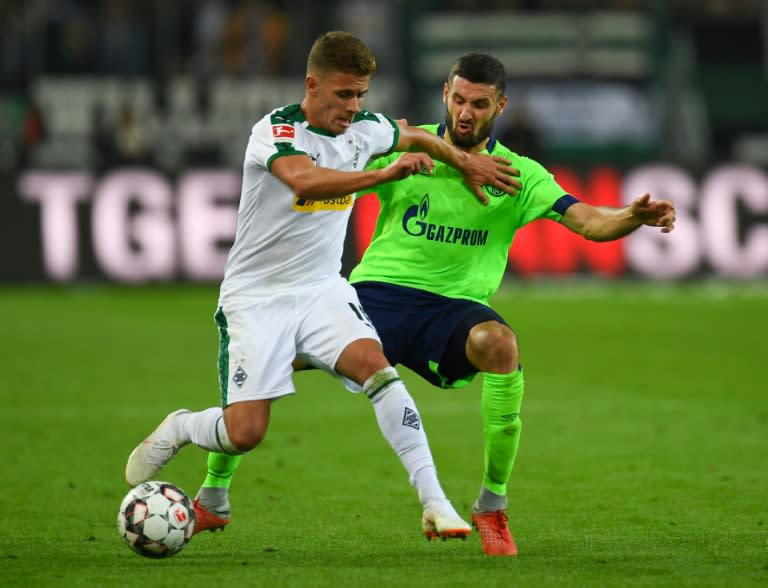 Moenchengladbach's Belgian forward Thorgan Hazard (L) has made a habit of doing well against Saturday's opponents Hertha Berlin with six goals and three assists in eight games