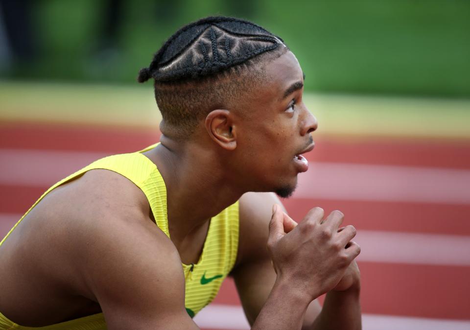 Oregon's Micah Williams watches the winners celebrate after coming in 7th in the men's 100 meters at the NCAA Outdoor Track & Field Championships.