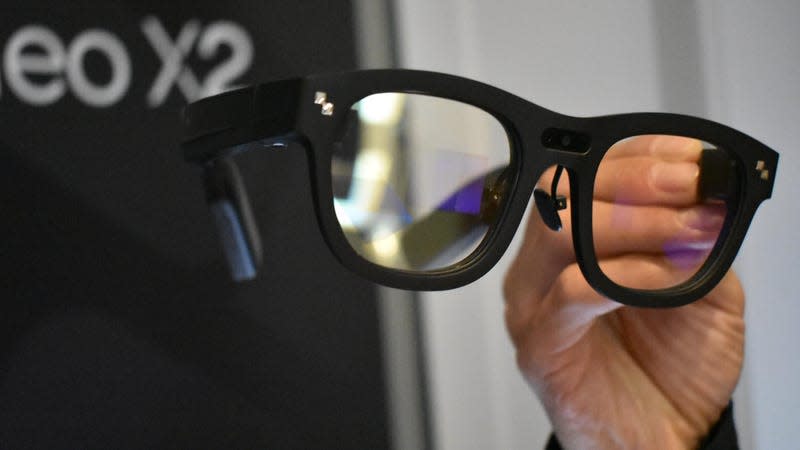 A pair of glasses with small camera displays on both sides.