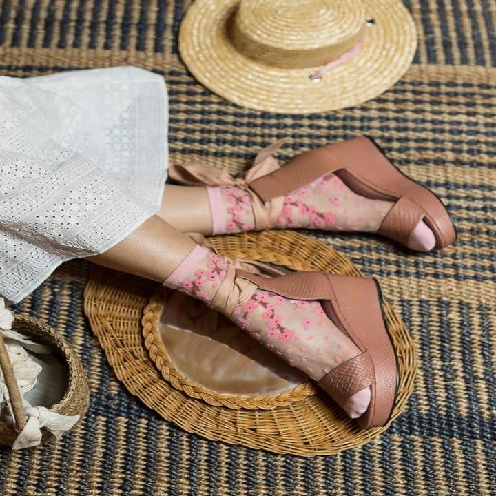 the cherry blossom socks worn with open toed wedges