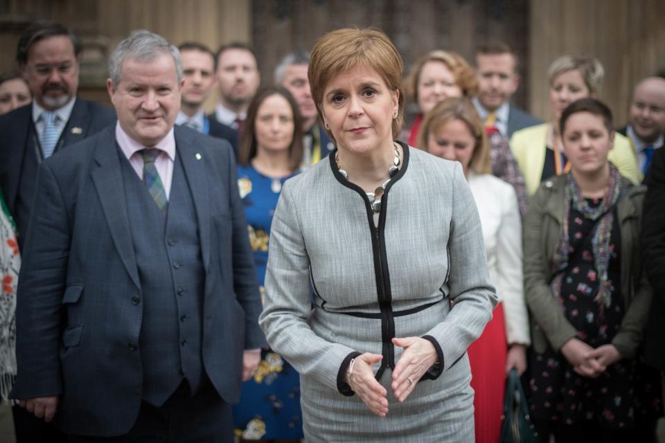 Scotland's First Minister Nicola Sturgeon and SNP MPs in Westminster Hall at the Houses of Parliament in London, ahead of a motion of no confidence in the Government being debated. (Stefan Rousseau/PA)