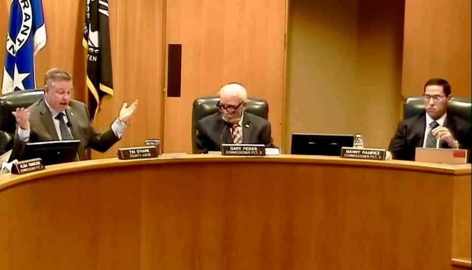 From left: County Judge Tim O’Hare of Southlake, Colleyville Commissioner Gary Fickes and Commissioner Manny Ramirez of rural northwest Tarrant County at the Tarrant County Commissioners’ Court meeting .Oct. 3, 2023.