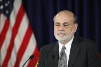 U.S. Federal Reserve Chairman Ben Bernanke pauses as he responds to reporters during his final planned news conference before his retirement, at the Federal Reserve Bank headquarters in Washington, December 18, 2013. REUTERS/Jonathan Ernst