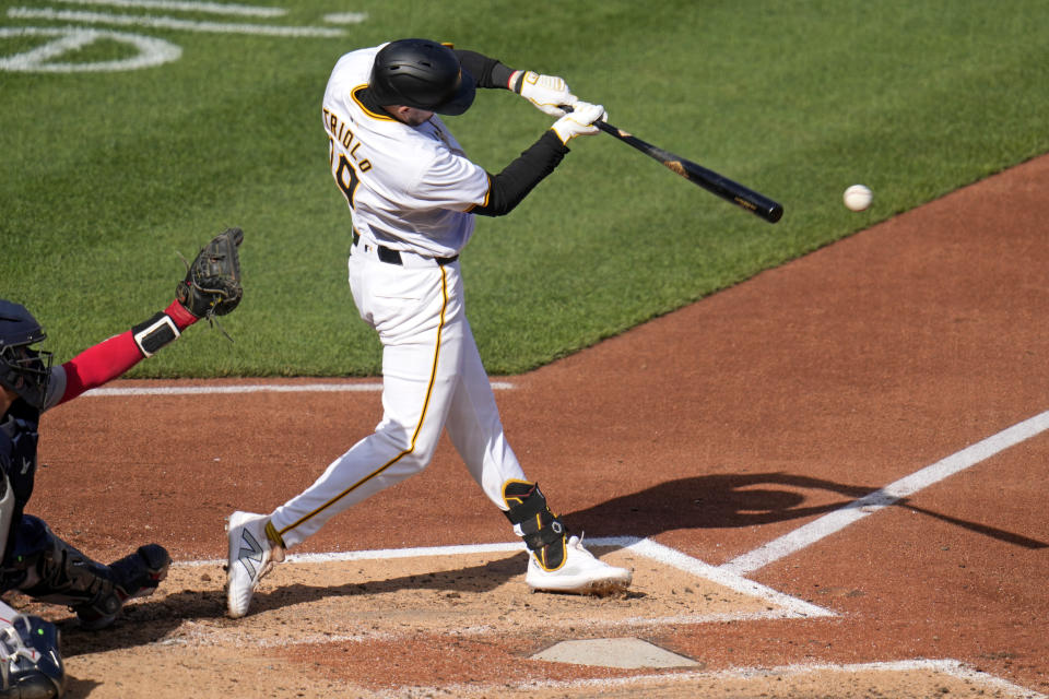 Pittsburgh Pirates' Jared Triolo singles off Boston Red Sox starting pitcher Kutter Crawford, driving in a run, during the fourth inning of a baseball game in Pittsburgh, Saturday, April 20, 2024. (AP Photo/Gene J. Puskar)
