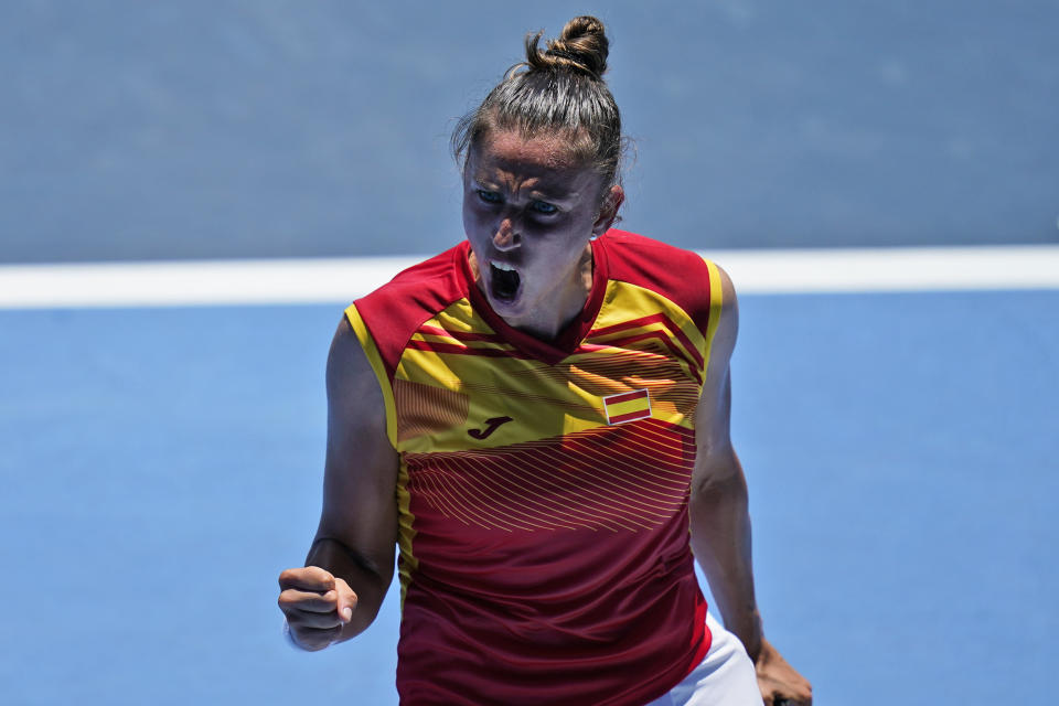 Sara Sorribes Tormo, of Spain, reacts after winning the first set against Ashleigh Barty, of Australia, during the first round of the tennis competition at the 2020 Summer Olympics, Sunday, July 25, 2021, in Tokyo, Japan. (AP Photo/Seth Wenig)