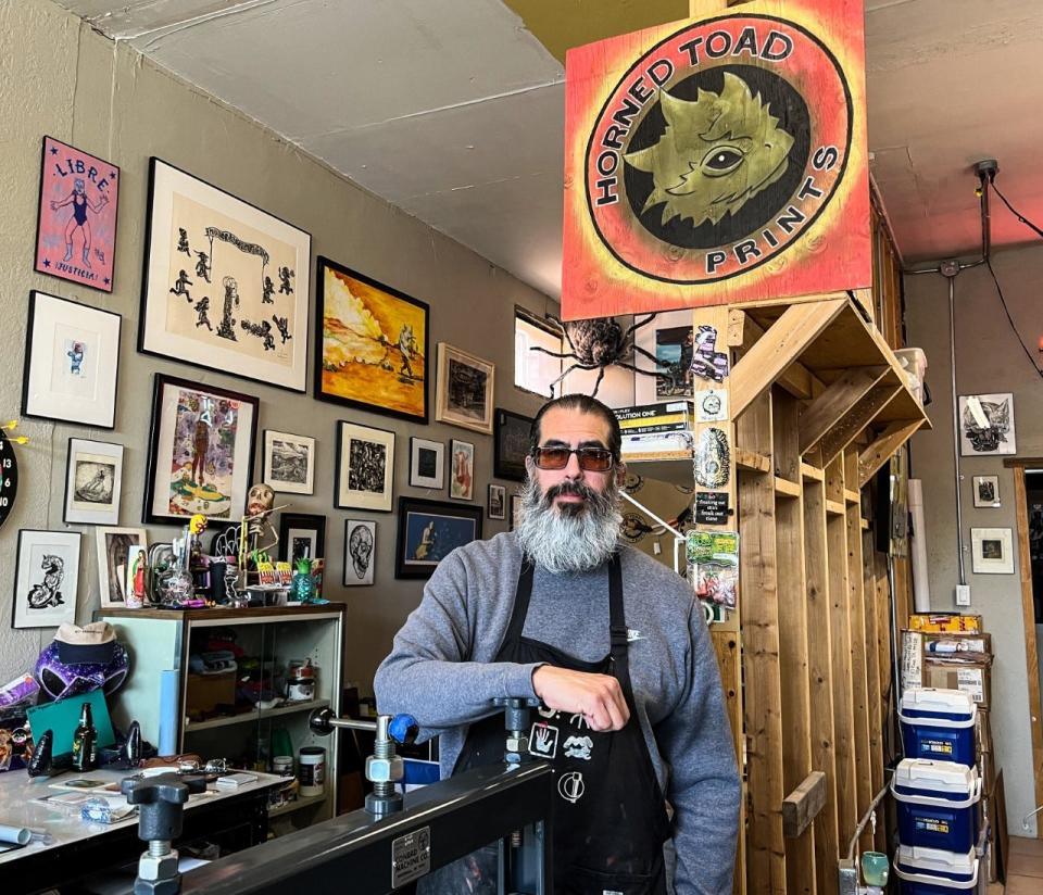 Printmaker and UTEP professor Manuel Guerra is shown at his Horned Toad Prints studio, 3107 Alameda Ave. On May 19, Guerra is presenting “The 8 x 8 Part II” exhibit at Alameda Art & Salvage, 3109 Alameda Ave., which is next to his studio. Prints for the show are in the coolers at right.