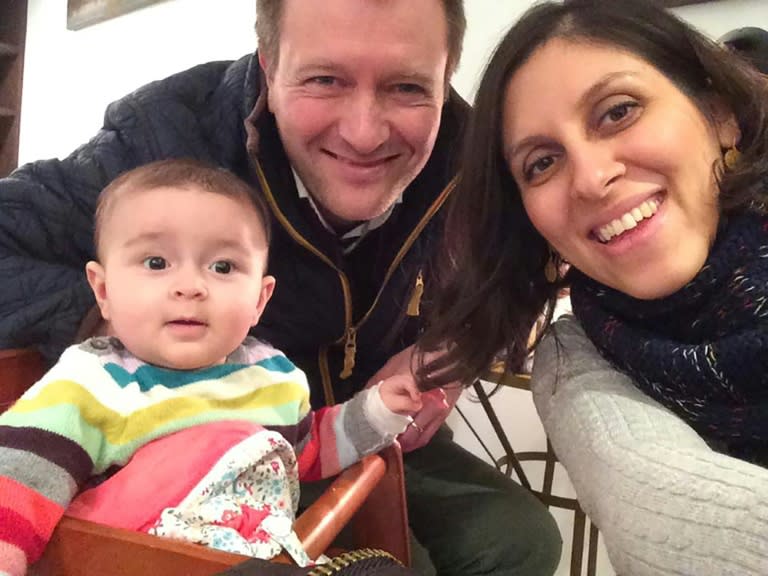 Nazanin Zaghari-Ratcliffe (R), pictured with her husband Richard and daughter Gabriella (L)