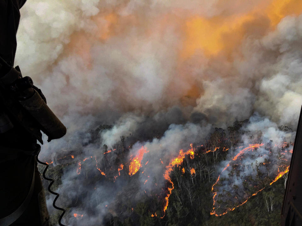 The Grose Valley fire in the Blue Mountains area of Lithgow and Blackheath, New South Wales is seen from a helicopter.