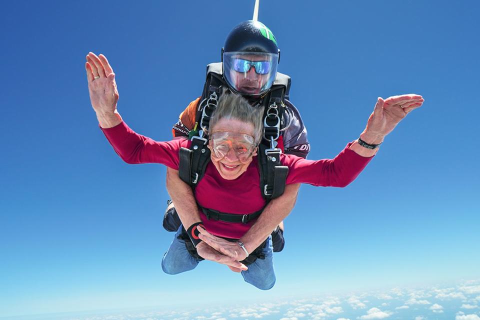 <p>Ryan Kramer/ Skydive Indianapolis</p> Kim Emmons Knor jumping with Skydive Indianapolis in July 2023