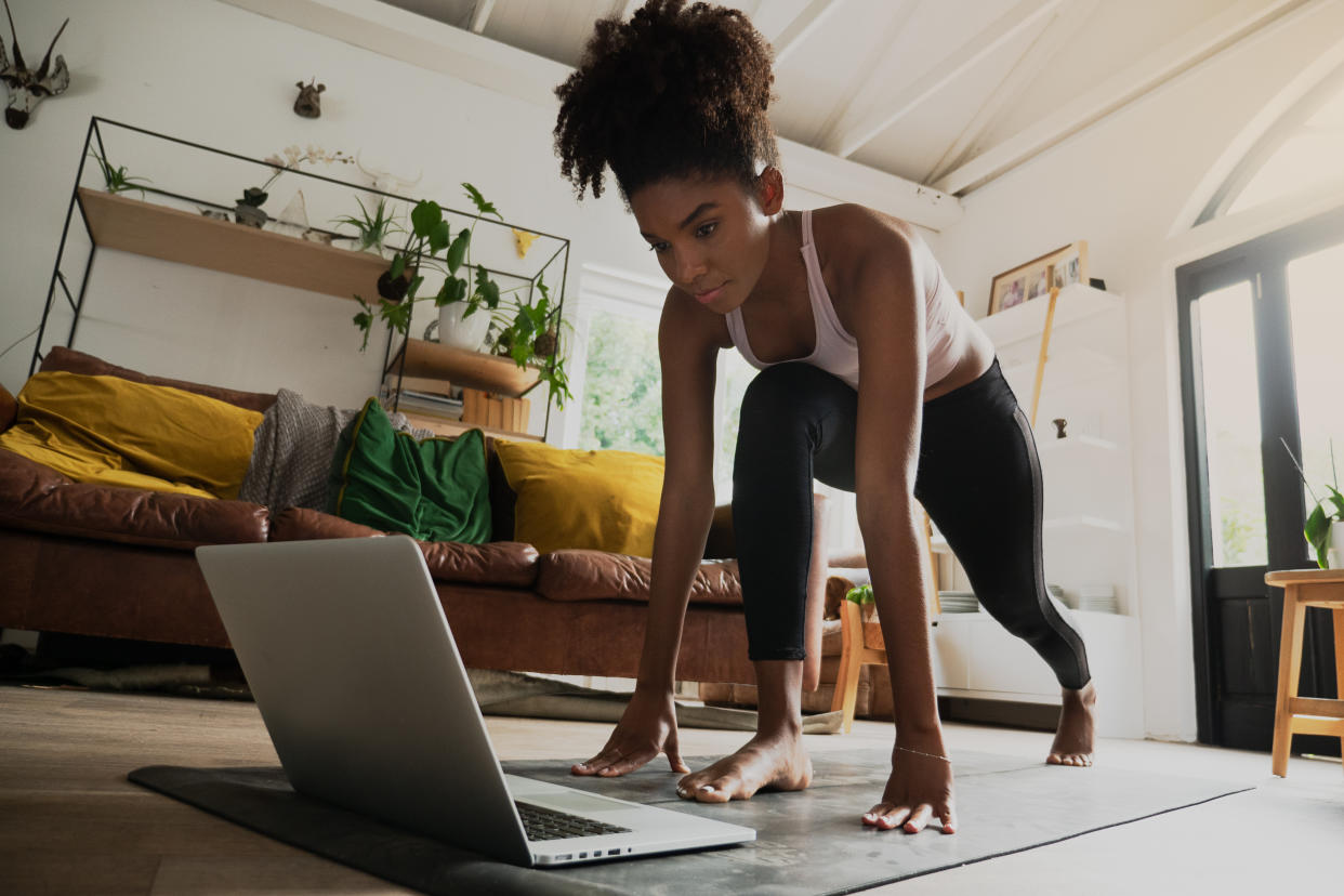 Working out at home is a great way to stay active in the face of cold weather and pandemic-related gym shutdowns. (Photo: Getty Images)