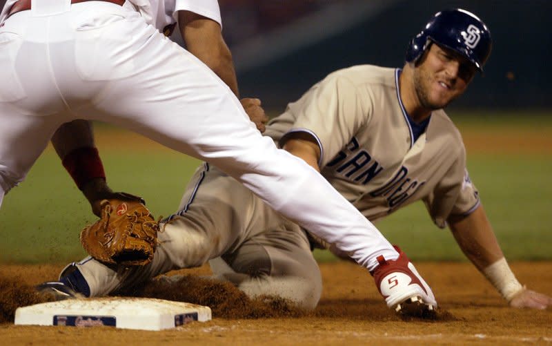 San Diego Padres Sean Burroughs is picked off of first base by St. Louis Cardinals Albert Pujols in the eighth inning at Busch Stadium in St. Louis on May 5, 2005. File Photo by Bill Greenblatt/UPI