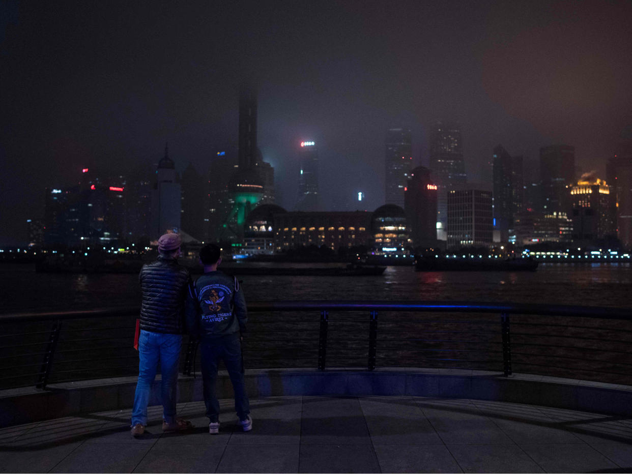The Shanghai skyline descends into darkness during Earth Hour last year: AFP