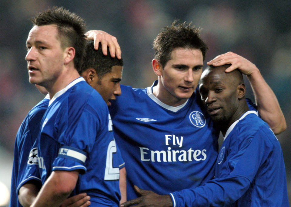 John Terry, Glen Johnsen, Frank Lampard and Claude Makelele from France, from left, jubilate after winning the Champions League 2nd round 1st leg soccer  match between VfB Stuttgart and Chelsea FC in the Gottlieb-Daimler stadium in Stuttgart, southern Germany, Wednesday, Feb. 25, 2004. (AP Photo/Ferdinand Ostrop)