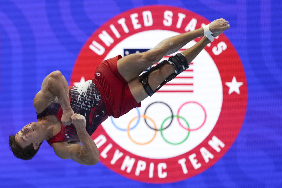 Brody Malone competes in the floor exercise at the United States Gymnastics Olympic Trials on Saturday, June 29, 2024, in Minneapolis. (AP Photo/Charlie Riedel)