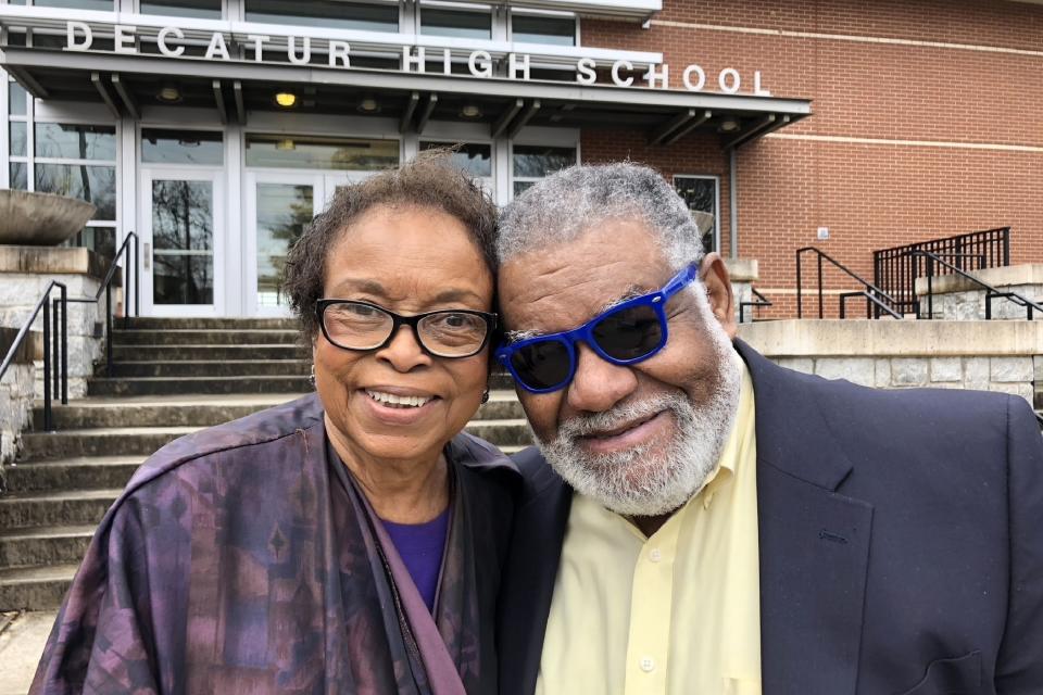 In this Feb. 13, 2020 photo, Roslyn Pope poses for a photo with Charles Black outside Decatur High School in Decatur, Ga. Roslyn Pope, a college professor and musician who wrote “An Appeal for Human Rights,” laying out the reasons for the Atlanta Student Movement against systemic racism in 1960, has died. She was 84. Pope died on Jan. 18 in Arlington, Texas, where she moved from Atlanta to be with her daughters after her health began to fail in 2021, according to her family's obituary. (AP Photo/Michael Warren, file)