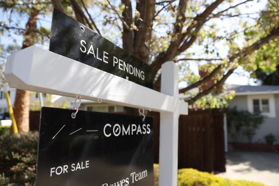 A sale pending sign is posted in front of a home for sale on March 18, 2022 in San Rafael, California. Sales of existing homes dropped 7.2% in February as mortgage rates top 4% (Credit: Justin Sullivan, Getty Images)