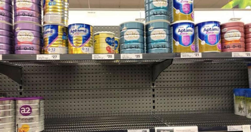 <span>An empty shelf showing one brand of baby formula cleared out at a Woolworths store in August. Photo: </span>Woolworths/Emma Garrard