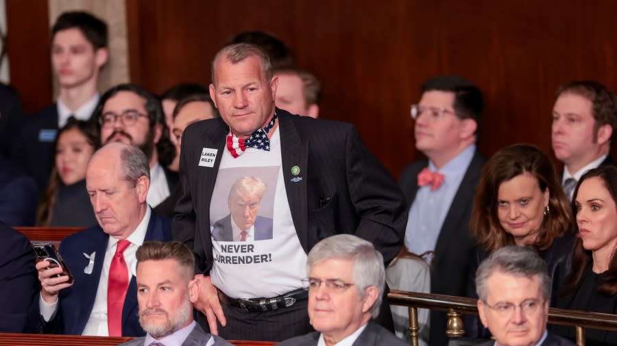 Rep. Troy Nehls (R-Texas) wears a shirt featuring former President Trump’s mug shot during President Biden’s State of the Union address. (Win McNamee/Getty Images)