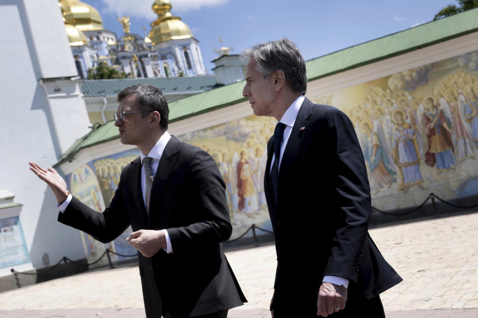 US Secretary of State Antony Blinken, right, and Ukraine's Foreign Minister Dmytro Kuleba, walk past the Saint Michael's Golden-Domed Monastery in Kyiv on Wednesday, May 15, 2024. (Brendan Smialowski/Pool Photo via AP)