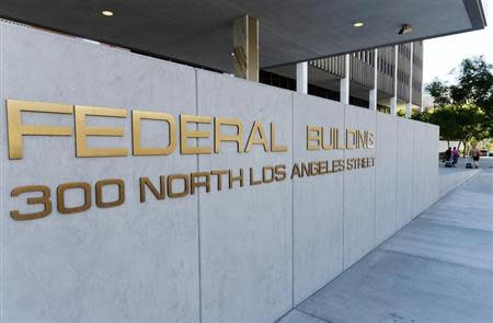 A view shows the sign for the Federal Building, where the Internal Revenue Service (IRS) offices are located, in Los Angeles, California October 1, 2013. REUTERS/Kevork Djamsezian