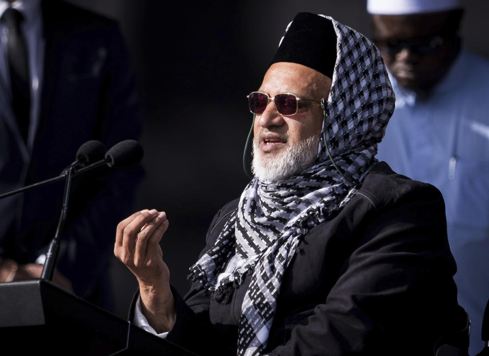 In this photo supplied by the New Zealand government, Mosque shooting survivor Farid Ahmed addresses the national remembrance service in Hagley Park for the victims of the March 15 mosques terrorist attack in Christchurch, New Zealand, Friday, March 29, 2019. (Mark Tantrum/New Zealand Government via AP)