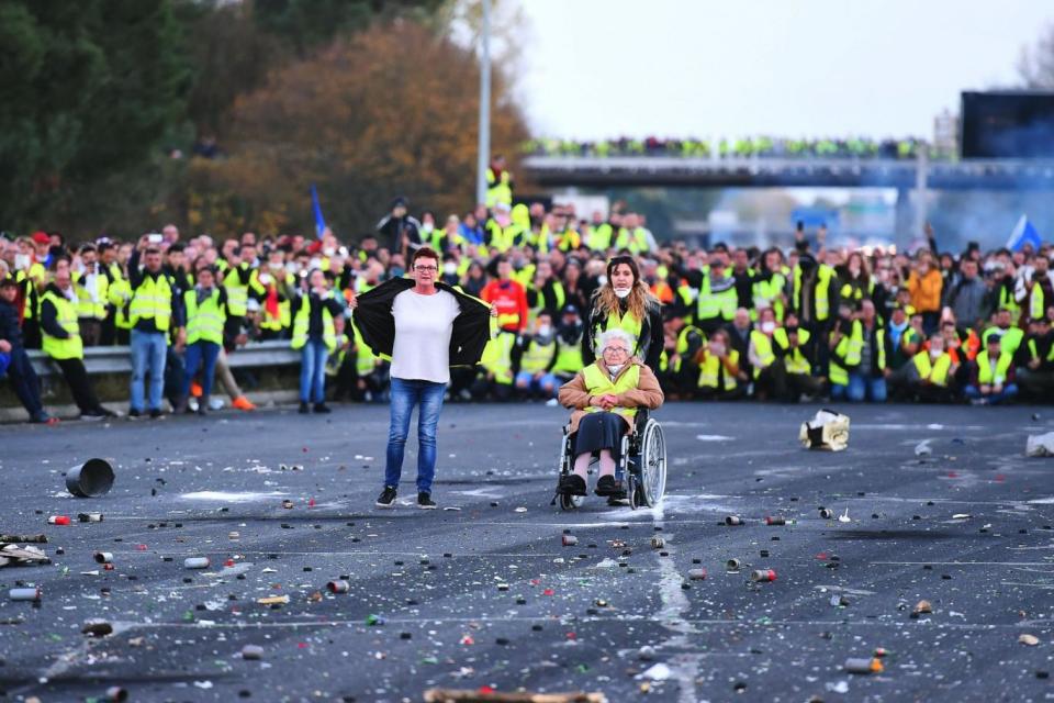 Protesters face riot police as they block the A10 motorway in Virsac, near Bordeaux (AFP/Getty Images)