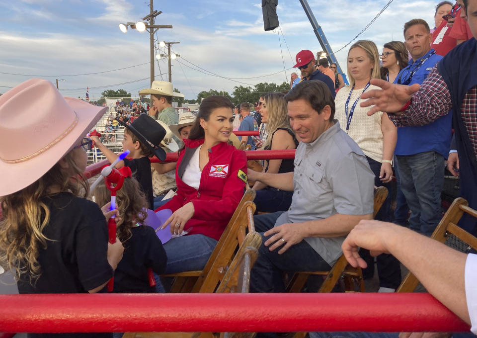 Republican presidential candidate Florida Gov. Ron DeSantis, his wife, Casey, and their children attend a rodeo in Ponca, Okla., Saturday, June 10, 2023. (AP Photo/Thomas Beaumont)