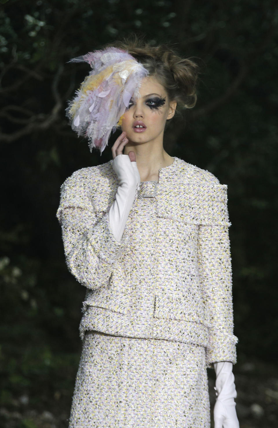 A model presents a creation by German fashion designer Karl Lagerfeld for Chanel's Spring-Summer 2013 Haute Couture fashion collection, presented in Paris, Tuesday, Jan.22, 2013. (AP Photo/Christophe Ena)