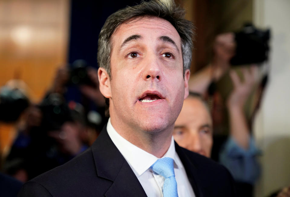 Michael Cohen talks to the news media after his testimony. (Photo: Joshua Roberts/Reuters)