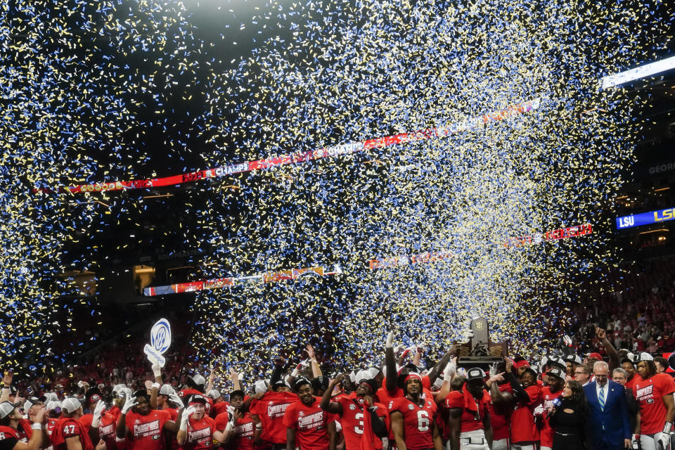 Georgia celebrates a win against LSU in the after the Southeastern Conference championship NCAA college football game, Saturday, Dec. 3, 2022, in Atlanta. (AP Photo/Brynn Anderson)