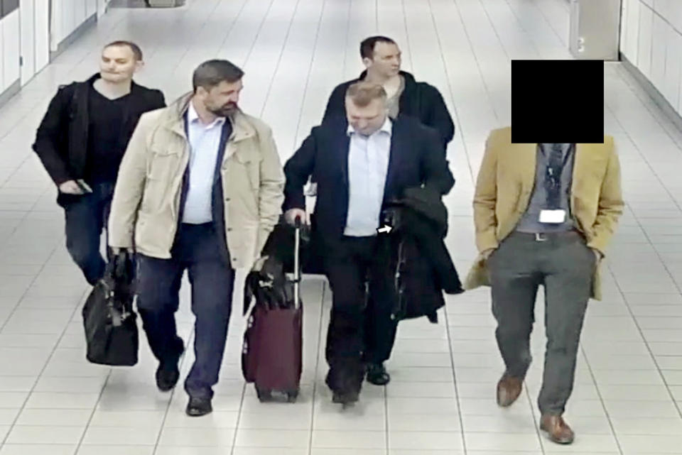 The four GRU officers who entered the Netherlands are pictured at Amsterdam’s Schiphol Airport (PA Images)