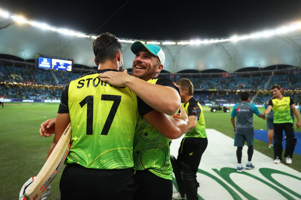 Seen here, Australia captain Aaron Finch and Marcus Stoinis celebrate their T20 World Cup semi-final win over Pakistan.