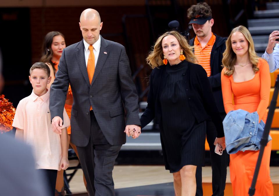 New Oklahoma State University head men's basketball coach Steve Lutz is introduced with his family during an introduction ceremony of the at Gallagher-Iba Arena in Stillwater, Okla., Thursday, April 4, 2024.