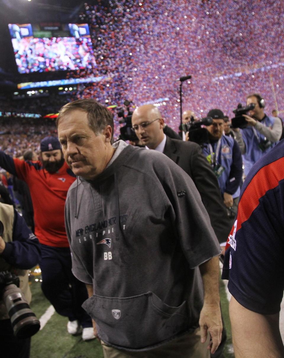 A disappointed Bill Belichick leaves the field after losing to the New York Giants in Super Bowl XLVI at Lucas Oil Stadium in Indianapolis on Feb. 5, 2012.