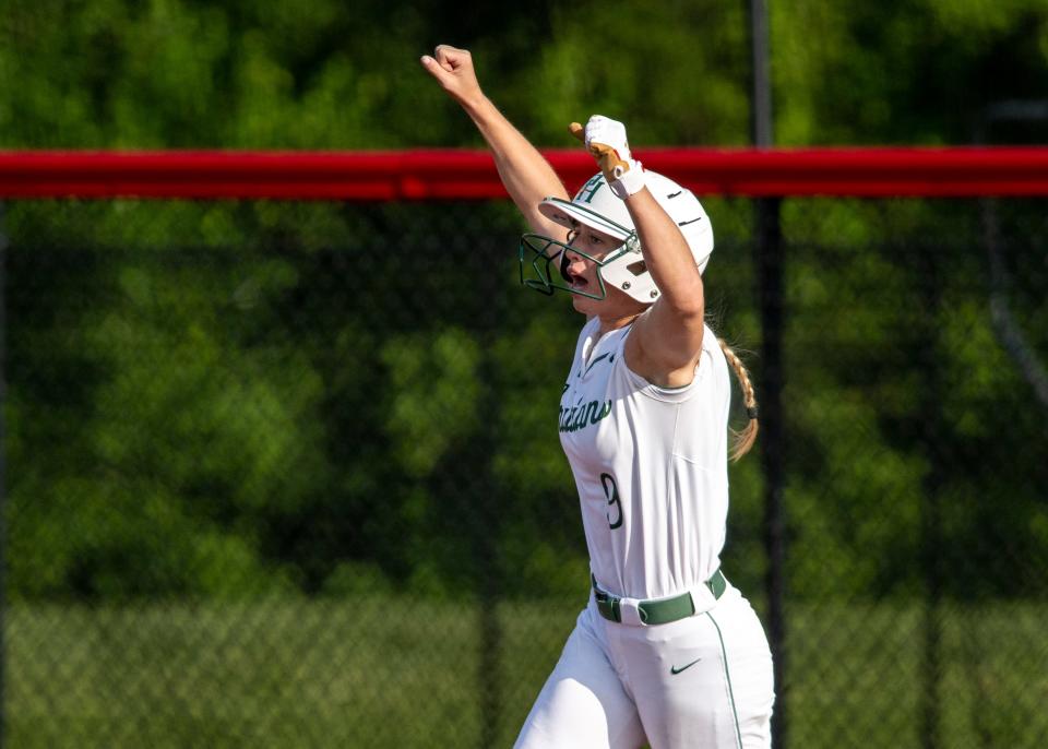 Pendleton Heights High School senior Bo Shelton (9) reacts as she rounds the bases after hitting a home run during a IHSAA Class 4A Softball Sectional Championship game against New Palestine High School, Thursday, May 25, 2023, at New Palestine High School.